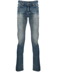 blaue enge Jeans mit Destroyed-Effekten von John Elliott