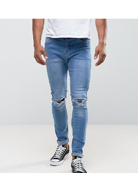 blaue enge Jeans mit Destroyed-Effekten von Liquor N Poker