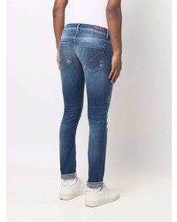 blaue enge Jeans mit Destroyed-Effekten von Dondup