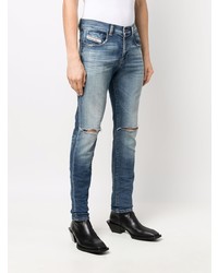 blaue enge Jeans mit Destroyed-Effekten von Diesel