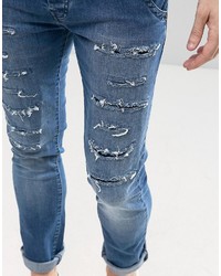 blaue enge Jeans mit Destroyed-Effekten von Loyalty And Faith