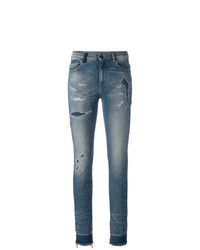 blaue enge Jeans mit Destroyed-Effekten von Marcelo Burlon County of Milan