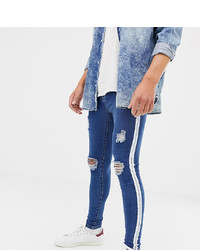 blaue enge Jeans mit Destroyed-Effekten von Mauvais