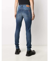 blaue enge Jeans mit Destroyed-Effekten von Diesel