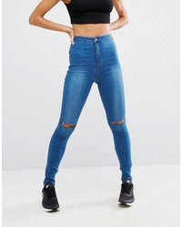 blaue enge Jeans mit Destroyed-Effekten von Missguided