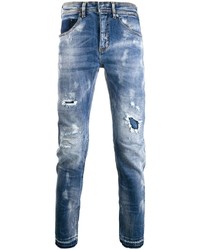 blaue enge Jeans mit Destroyed-Effekten von Neil Barrett