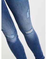 blaue enge Jeans mit Destroyed-Effekten von Only