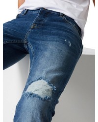 blaue enge Jeans mit Destroyed-Effekten von ONLY & SONS