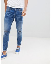 blaue enge Jeans mit Destroyed-Effekten von ONLY & SONS