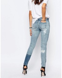 blaue enge Jeans mit Destroyed-Effekten von Blank NYC