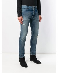 blaue enge Jeans mit Destroyed-Effekten von Balmain