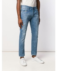 blaue enge Jeans mit Destroyed-Effekten von Dondup