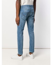 blaue enge Jeans mit Destroyed-Effekten von Dondup