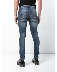 blaue enge Jeans mit Destroyed-Effekten von Philipp Plein