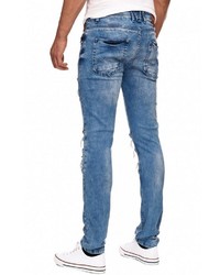 blaue enge Jeans mit Destroyed-Effekten von RUSTY NEAL