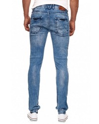 blaue enge Jeans mit Destroyed-Effekten von RUSTY NEAL