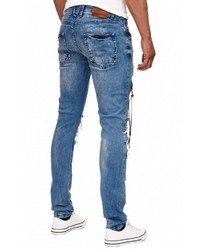 blaue enge Jeans mit Destroyed-Effekten von RUSTY NEAL