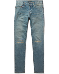 blaue enge Jeans mit Destroyed-Effekten von Saint Laurent