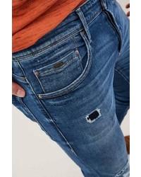 blaue enge Jeans mit Destroyed-Effekten von SALSA