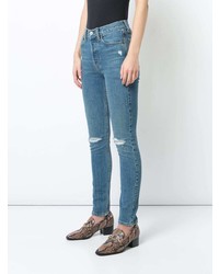 blaue enge Jeans mit Destroyed-Effekten von RE/DONE