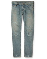 blaue enge Jeans mit Destroyed-Effekten von Saint Laurent