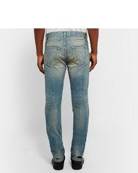 blaue enge Jeans mit Destroyed-Effekten von Saint Laurent