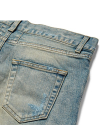 blaue enge Jeans mit Destroyed-Effekten von Saint Laurent