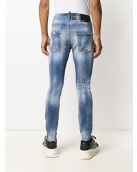 blaue enge Jeans mit Destroyed-Effekten von DSQUARED2