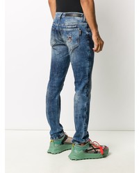 blaue enge Jeans mit Destroyed-Effekten von Philipp Plein