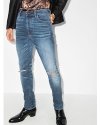 blaue enge Jeans mit Destroyed-Effekten von Amiri