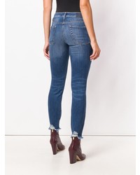 blaue enge Jeans mit Destroyed-Effekten von Cambio