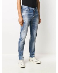 blaue enge Jeans mit Destroyed-Effekten von DSQUARED2