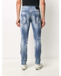 blaue enge Jeans mit Destroyed-Effekten von DSQUARED2