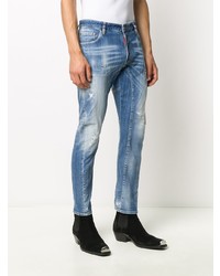 blaue enge Jeans mit Destroyed-Effekten von DSQUARED2