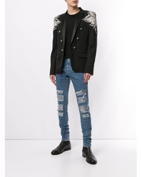 blaue enge Jeans mit Destroyed-Effekten von Balmain