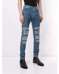 blaue enge Jeans mit Destroyed-Effekten von Balmain