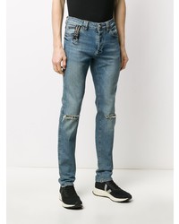 blaue enge Jeans mit Destroyed-Effekten von Philipp Plein