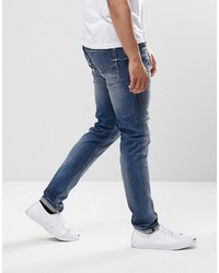 blaue enge Jeans mit Destroyed-Effekten von Diesel