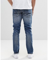 blaue enge Jeans mit Destroyed-Effekten von Diesel