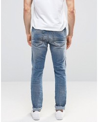 blaue enge Jeans mit Destroyed-Effekten von Diesel