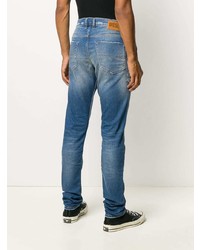 blaue enge Jeans mit Destroyed-Effekten von Diesel