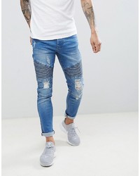 blaue enge Jeans mit Destroyed-Effekten von Threadbare