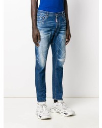 blaue enge Jeans mit Destroyed-Effekten von DSQUARED2