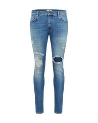 blaue enge Jeans mit Destroyed-Effekten von Tommy Hilfiger