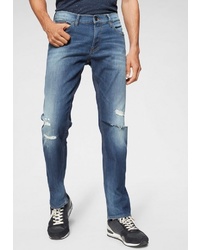 blaue enge Jeans mit Destroyed-Effekten von Tommy Jeans