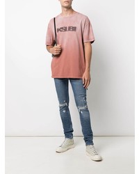 blaue enge Jeans mit Destroyed-Effekten von Ksubi