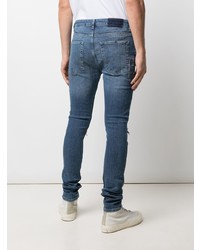 blaue enge Jeans mit Destroyed-Effekten von Ksubi