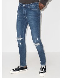 blaue enge Jeans mit Destroyed-Effekten von Ksubi