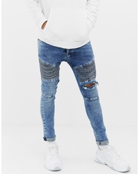 blaue enge Jeans mit Destroyed-Effekten von Voi Jeans