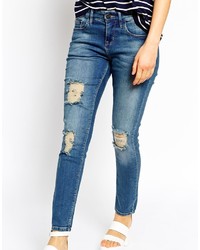 blaue enge Jeans mit Destroyed-Effekten von WÅVEN